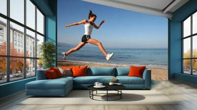 jumping on the beach Wall mural