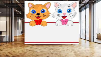 two merry kittens hold a clean banner Wall mural