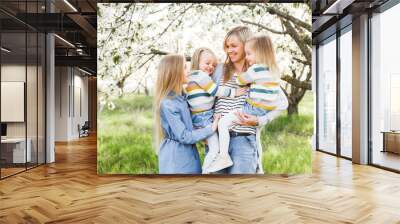 Happy family. mother of many children and three daughters child girl summer outdoors Wall mural