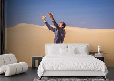 Exhausted man in the desert. Apathy, fatigue, exhaustion, mental disorders concept. Mental health Wall mural