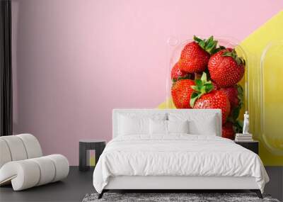 Fresh ripe strawberries in plastic container on duotone background. Top view and copy space. Organic food concept. Wall mural