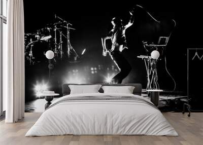 Band on stage. Vocalist silhouette  Wall mural