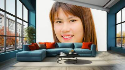 asian cute girl smiling on white background Wall mural