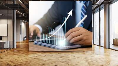 Businessman analyzing financial data for growth and profit strategies, Financial analysis and planning for business success, Financial analysis and planning and strategies to maximize sales profits. Wall mural