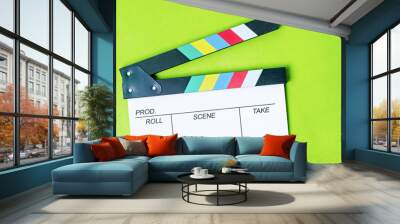 Clapperboard on green background Wall mural