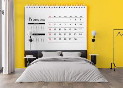 The June 2023 Monthly desk calendar for 2023 year on yellow background. Wall mural