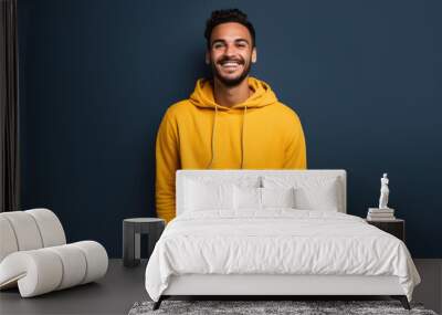 a man wearing a yellow hoodie against a blue background. Generative AI Wall mural