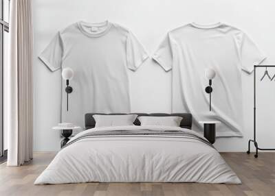 Flat lay of two white t-shirts showing both front and back sides on a white background Wall mural