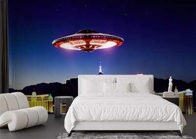 Aliens in a spaceship fly over Las Vegas. Wall mural