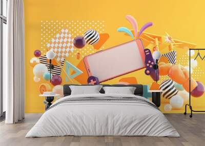 Smart phones and devices, playing games around the wheels, boxing gloves And aircraft On an orange background.-3d rendering.. Wall mural