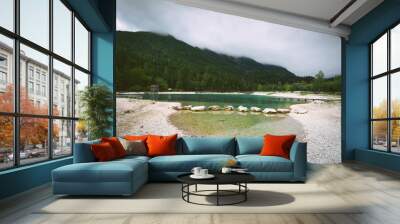 Beautiful tranquil landscape of Jasna lake in cloudy day. Julian alps, Slovenia Wall mural