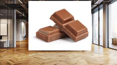 Cubes of milk chocolate bar isolated on white background Wall mural