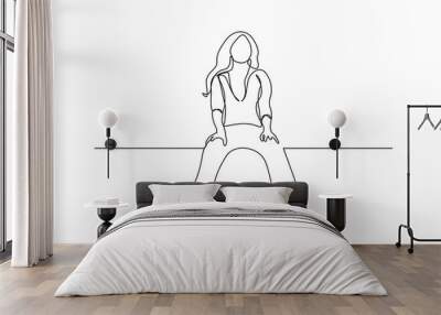 Girl sitting high with dangling feet in continuous line art drawing style. Minimalist black linear sketch isolated on white background. Vector illustration Wall mural