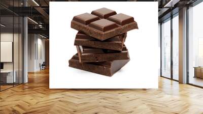 Stack of dark chocolate bar pieces isolated on white background Wall mural