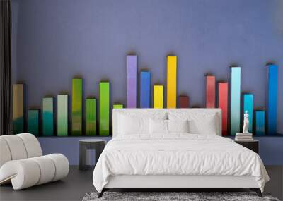 Colorful chart lines in real world made of rainbow colored plastic bricks. Wall mural