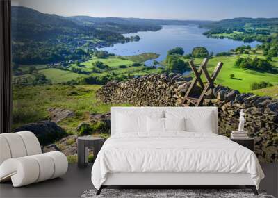 A morning shot of Lake Windermere showing the stone walling and the stile providing passage over the wall.  Wall mural