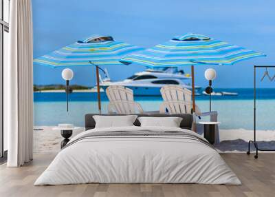 White Chairs and Umbrella beach canopy with Sea View at tropical blue water beach Wall mural