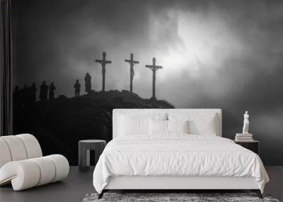 three crosses on top of hill stand against a darkening sky. Wall mural