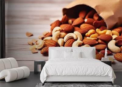 Mixed nuts in wooden bowl and scattered on table. copy space, top view. Generative AI Wall mural