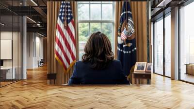 Democrat female politician sitting in her desk in the oval office of the White House. Back view of presidential candidate working in the west wing Wall mural