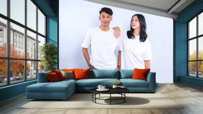 Asian man and woman couple wearing white t-shirt for mockup.	 Wall mural