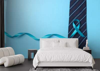 Blue ribbon symbolic for prostate cancer awareness campaign and men's health in November and September month Wall mural