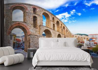 Cityscape with medieval aqueduct Kamares in the Kavala city, Macedonia, Greece.  Wall mural