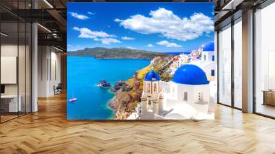 Oia town on Santorini island, Greece. Traditional and famous houses and churches with blue domes over the Caldera, Aegean sea Wall mural