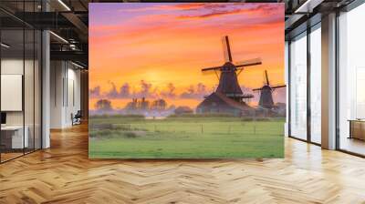 Traditional village with dutch windmills and river at sunset, Holland, Netherlands. Wall mural