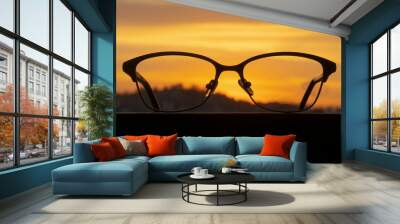 sun glasses on a sunset background Wall mural