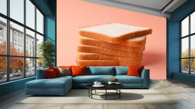 stack of bread slices over peach background Wall mural