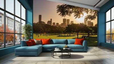 Afternoon scene of the new farm park and urban skyline from afar in golden hours in Brisbane Wall mural