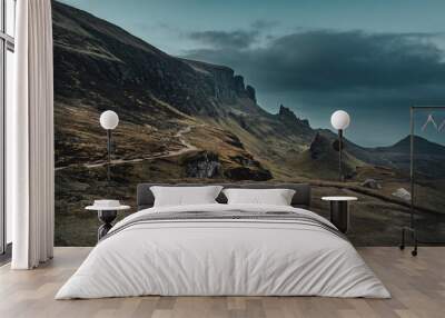 The view of the footpath and mountains in the Quiraing when the sky turns dark Wall mural