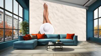 summer holiday fashion concept - tanning woman wearing sun hat at the beach on a white sand shot fro Wall mural