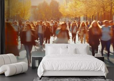 Crowd of students walking through a college campus on a sunny autumn day, motion blur Wall mural