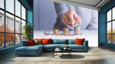 Coin stacks on a table,Saving money concept Wall mural