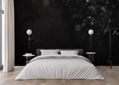 abstract real dust floating over black background for overlay Wall mural