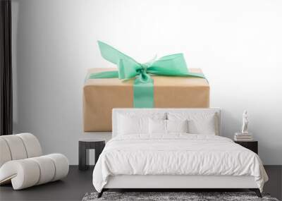 Brown paper gift box with green ribbon isolated on white Wall mural