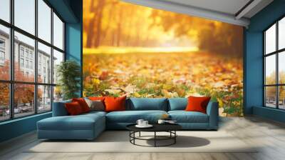 fallen autumn leaves on grass in sunny morning light Wall mural