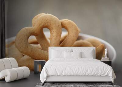 heart cookies for valentines day in white bowl on wood table Wall mural