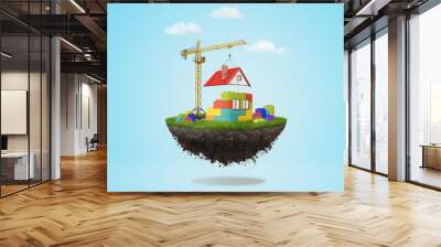 3d rendering of a building crane putting a roof on blocks house on a piece of land in the air on blue sky background Wall mural