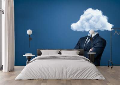 Businessman with white cloud instead of head on blue background Wall mural