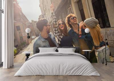 Couples enjoying a walk outdoors in the city Wall mural