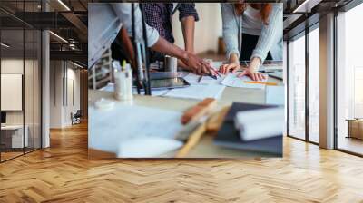 Diverse artists working on design in modern office Wall mural