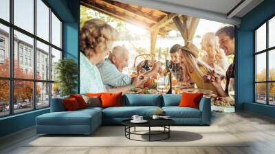 Multigenerational family having lunch in a gazebo on the vineyard Wall mural