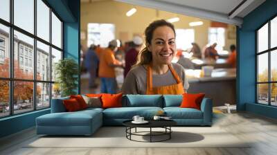 Portrait of a female volunteer working and volunteering at a community centar Wall mural