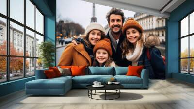 Portrait of a happy young caucasian family taking a photo in Paris France Wall mural