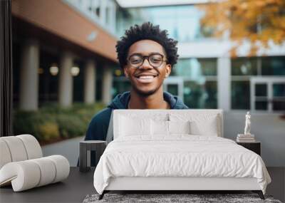 Smiling portrait of a happy male african american student on a college campus Wall mural