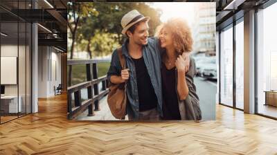 Young couple in the city Wall mural