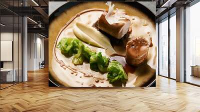 Goose breast galantine, mushroom fricassee, young cabbage and sa Wall mural